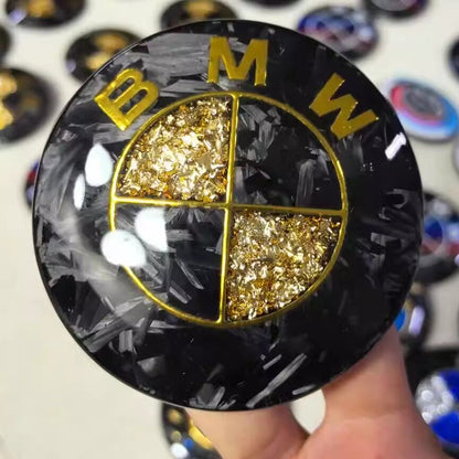 Suitable for BMW front and rear emblems, hood emblems, black and gold dual-tone front and rear wheels, custom steering wheel logos, carbon fiber